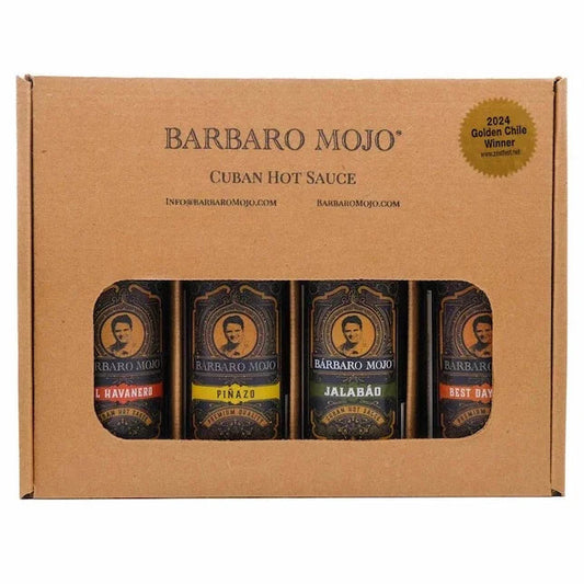 Barbaro Mojo Cuban hot sauce gift box holding El Havanero, Piñazo, Jalabáo and Best Day Ever, with the 2024 Golden Chile winner seal