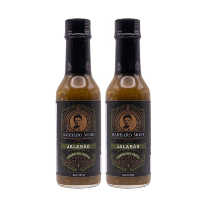 Two bottles of Barbaro Mojo Jalabáo Cuban hot sauce on a white background