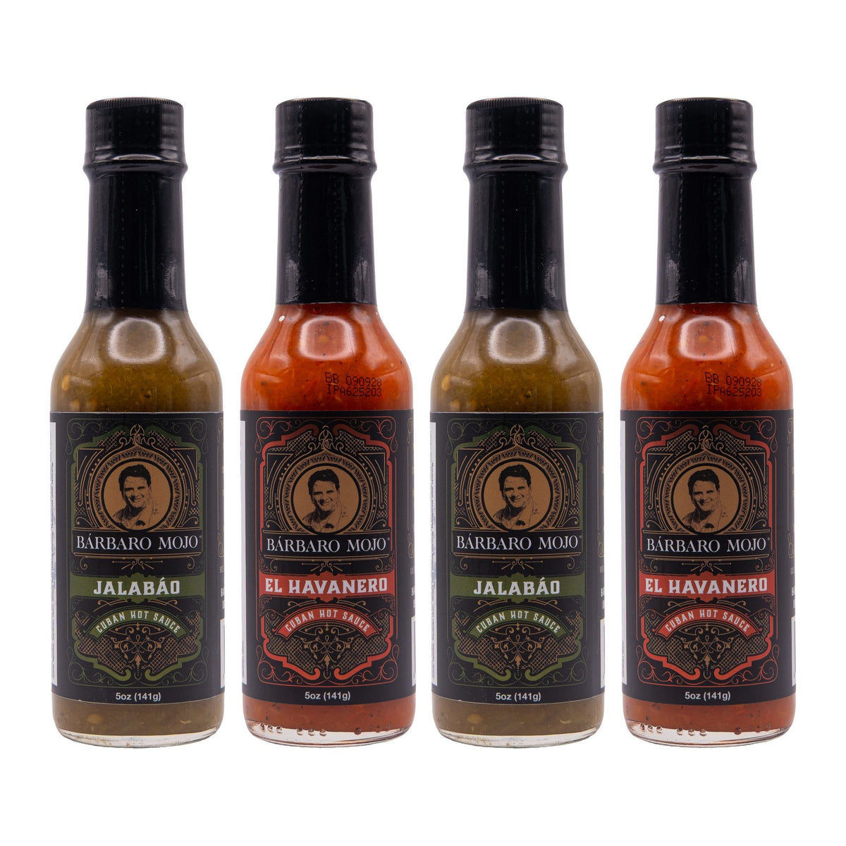 Four Barbaro Mojo bottles, two Jalabáo and two El Havanero, on a white background