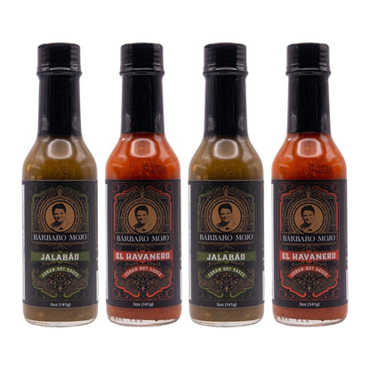 Four Barbaro Mojo bottles, two Jalabáo and two El Havanero, on a white background