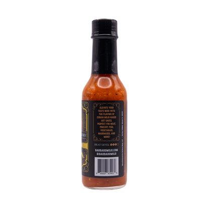 Back label of Barbaro Mojo Piñazo Cuban hot sauce with the heat level and barcode