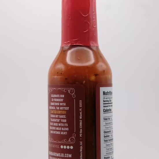 360 degree spin of a bottle of Barbaro Mojo Matanza Cuban hot sauce with the new foil label