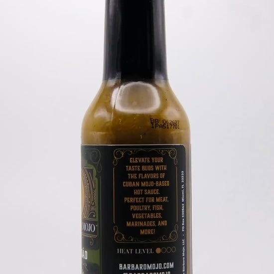 360 degree spin of a bottle of Barbaro Mojo Jalabáo Cuban hot sauce with the new foil label